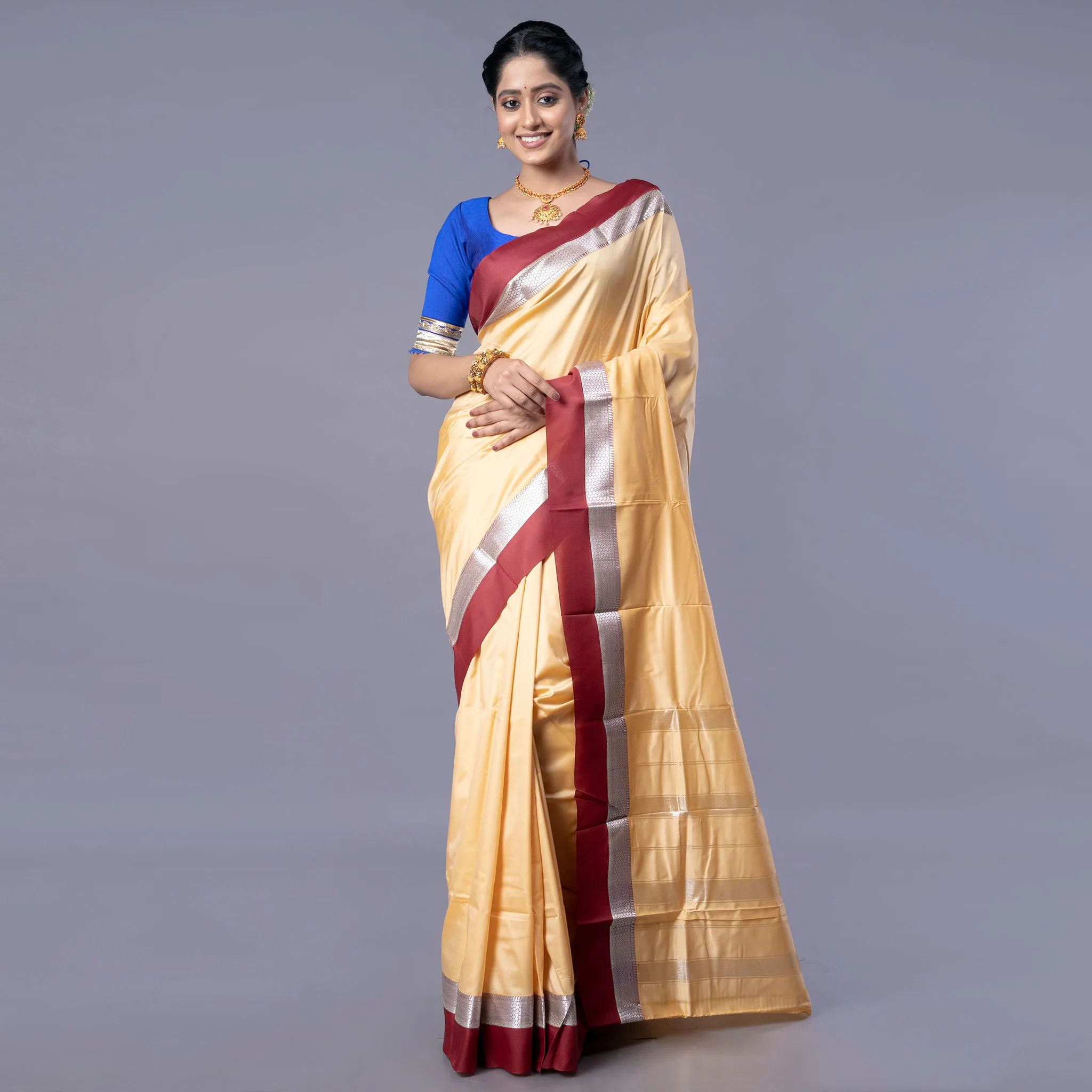 Women Kanjivaram Silk Saree In Beige Color With Maroon And Silver Border