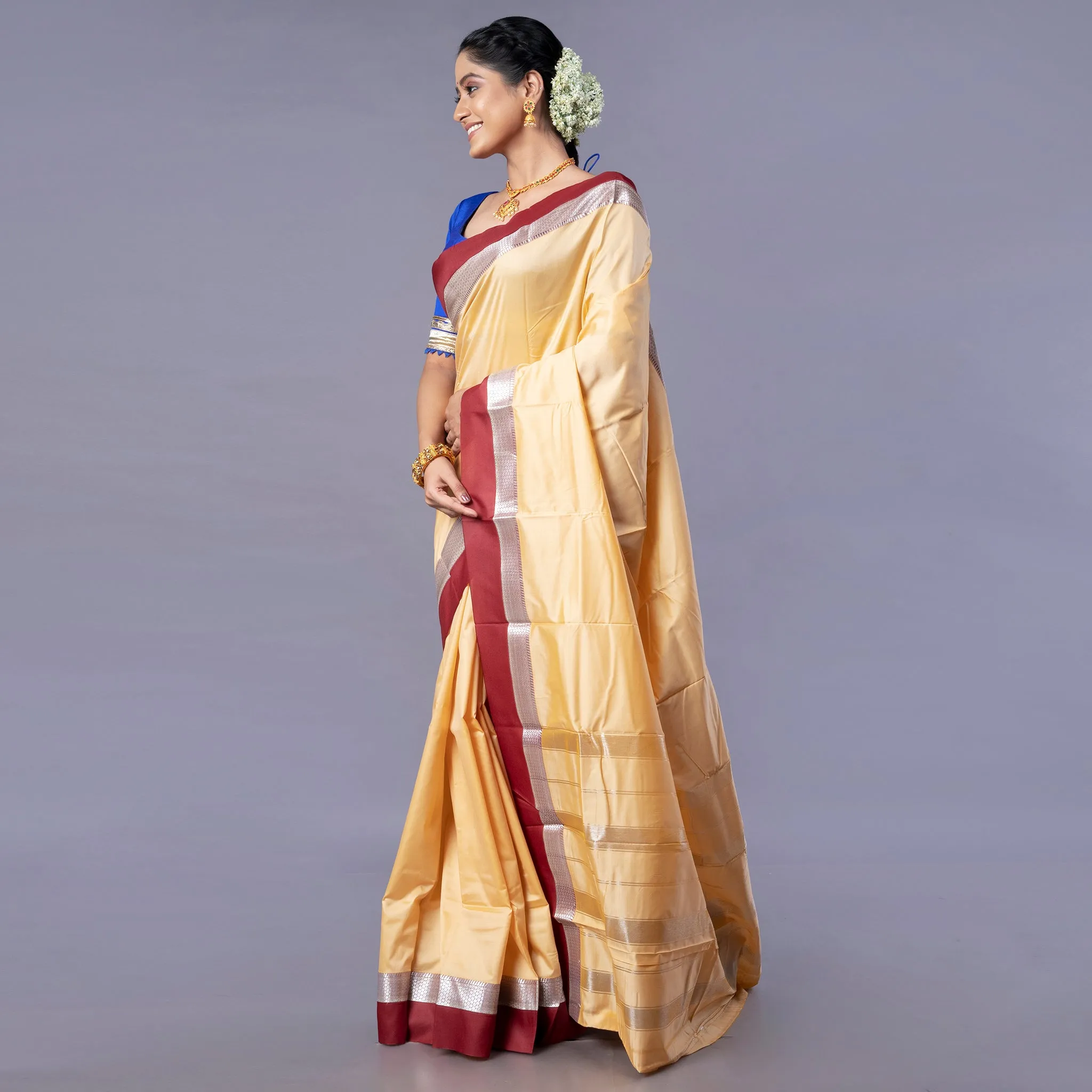 Women Kanjivaram Silk Saree In Beige Color With Maroon And Silver Border