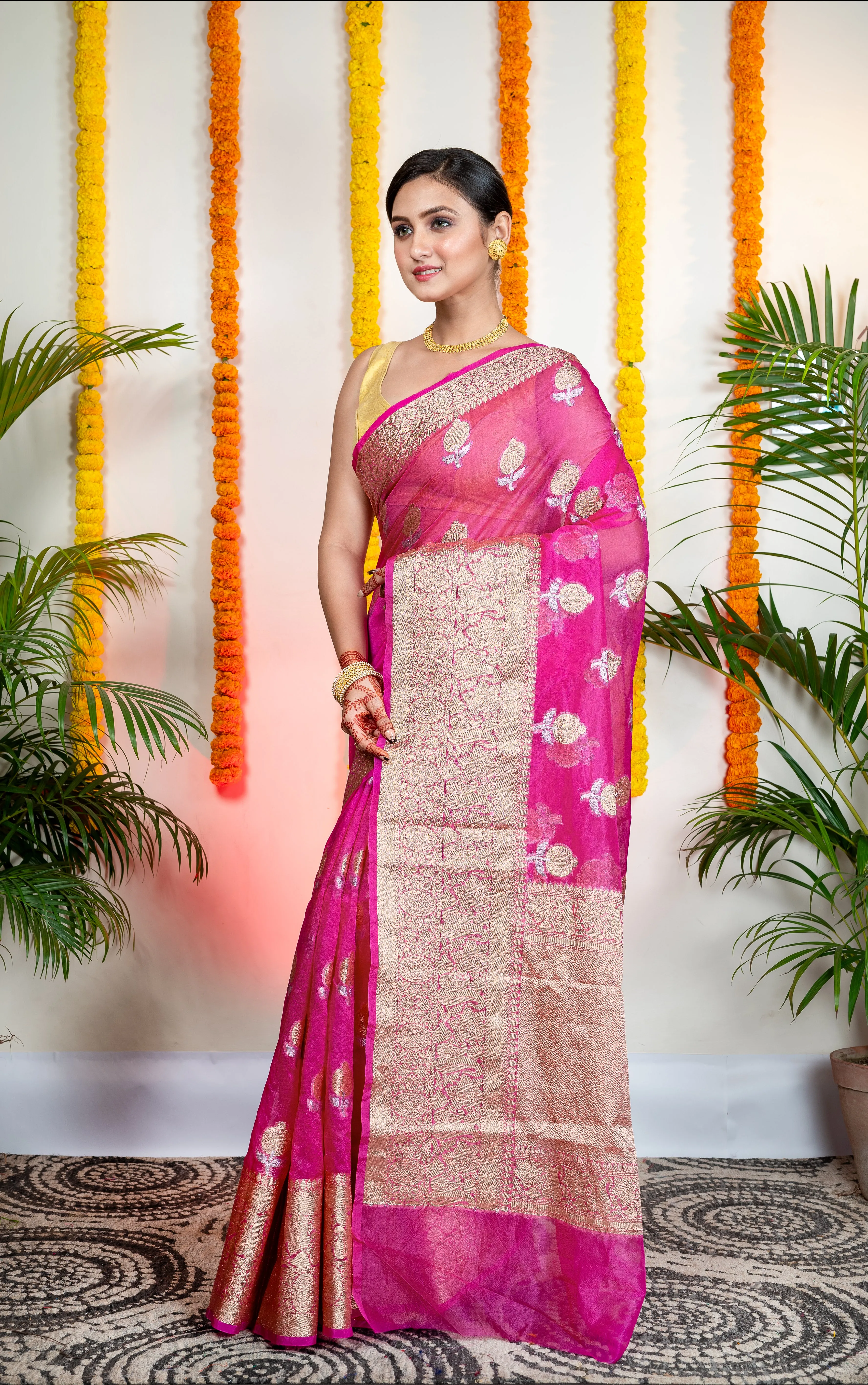 Women Pink Organza Silk Saree With Zari Border And Floral Motifs