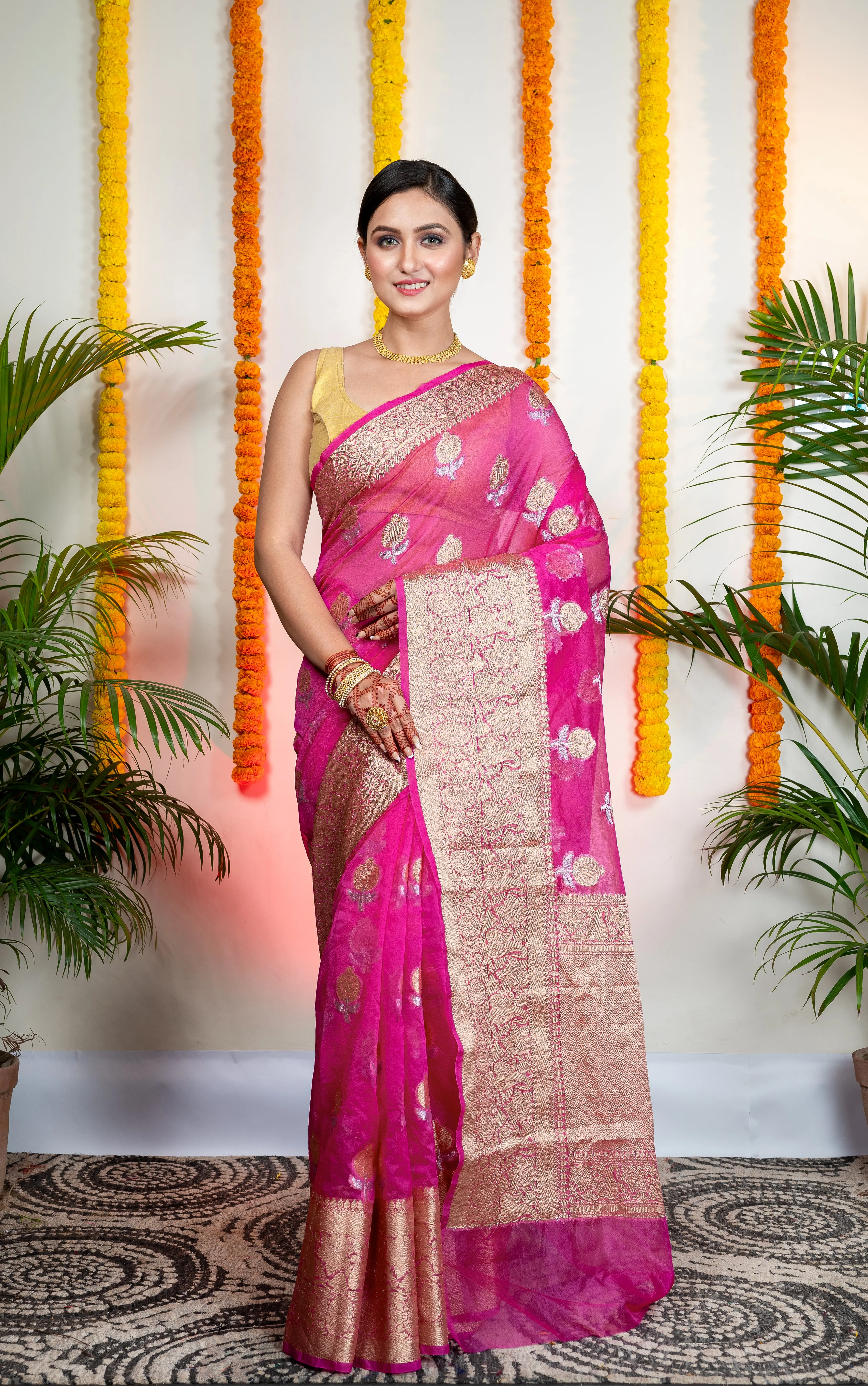 Women Pink Organza Silk Saree With Zari Border And Floral Motifs